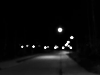Illuminated street lights at night