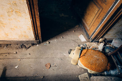 High angle view of broken can on floor