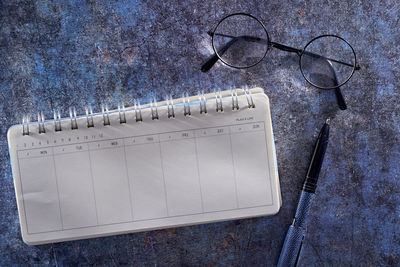 High angle view of eyeglasses on table