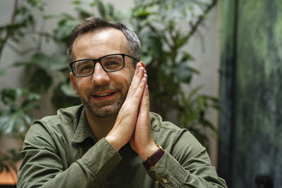 Portrait of man wearing eyeglasses