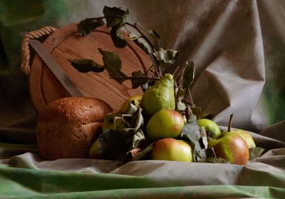 Close-up of apples on leaves