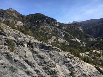 Scenic view of rocky mountains against sky