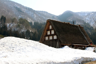 Snow covered mountain against sky