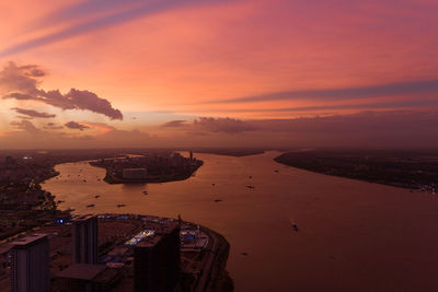 High angle view of sea against sky during sunset