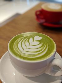 Coffee cup on table