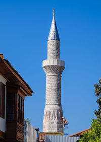 Low angle view of building against blue sky