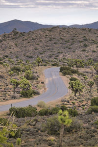 High angle view of road amidst landscape against sky