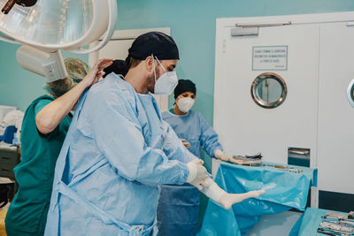 Portrait of doctor examining chemical