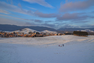 Scenic view of snowcapped mountains against sky