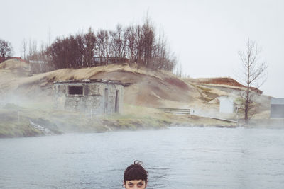 Portrait of woman in lake