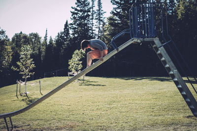 Boy on slide