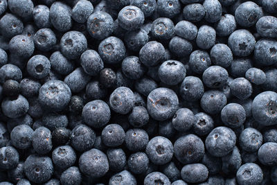 Big box with scattered fresh blueberries, fresh raw food, natural healthy food