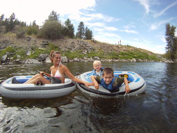 Mother and children outdoors