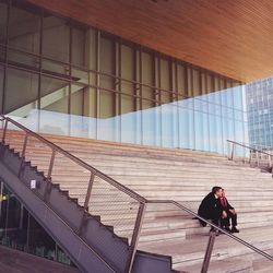 People in front of modern building