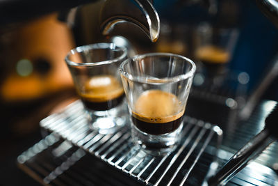 Close-up of coffee on espresso machine