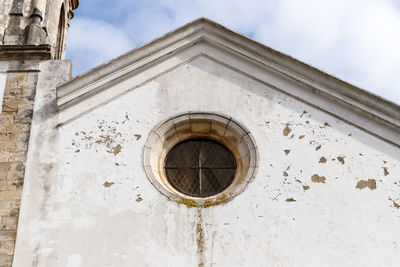 Santarem, portugal - architectural detail of the facade of santa maria de marvila church 