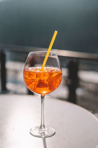 Close-up of wineglass on table