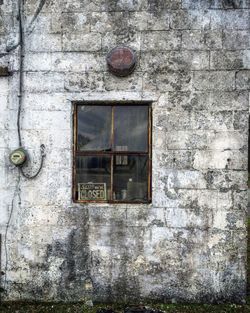 Brick wall with closed door