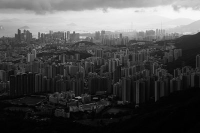 High angle view of buildings in city against sky