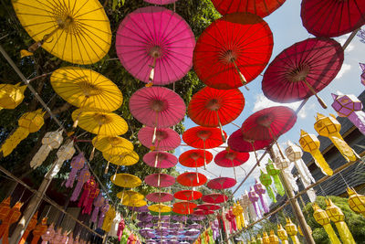 Low angle view of lanterns hanging in row