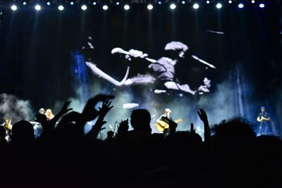 Group of people at music concert