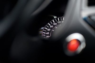 Close-up of illuminated speedometer in car