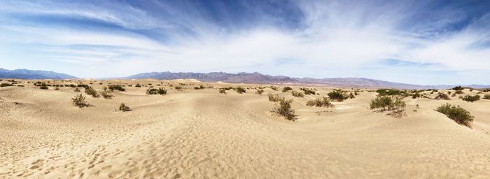 Panoramic view of desert against sky