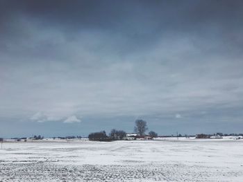 Scenic view of land against sky during winter