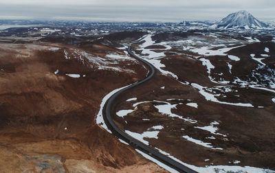 Aerial view of snow covered land