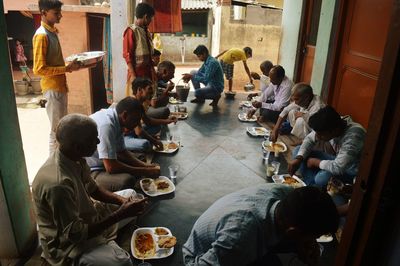 People having food in corridor