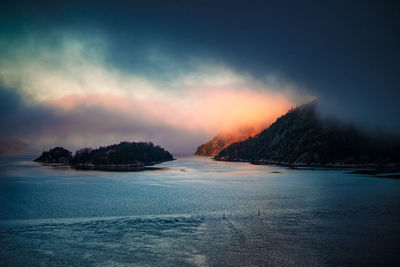 Scenic view of sea against sky at sunset