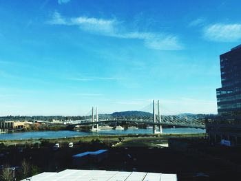 Cityscape against blue sky