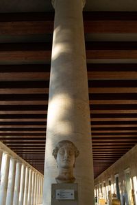 Low angle view of statue against building