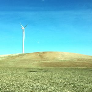 Wind turbines on field