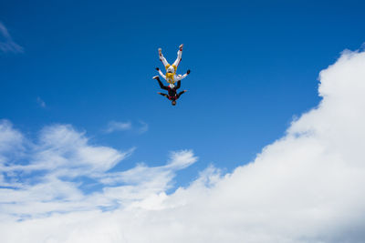 Low angle view of kite in sky