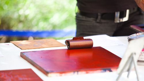Close-up of man working on table