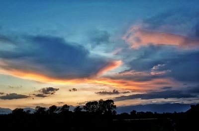 Scenic view of dramatic sky during sunset