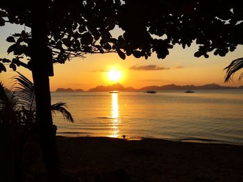 Scenic view of sea at sunset