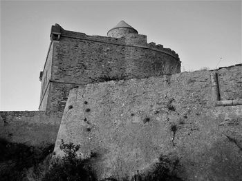 Low angle view of old ruin against sky