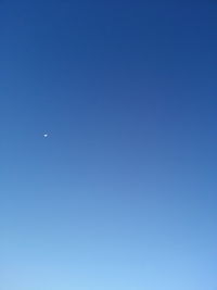 Low angle view of clear blue sky