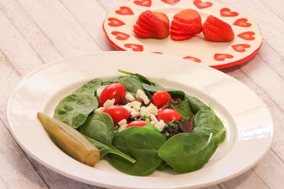 High angle view of salad in plate on table