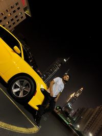 High angle view of car on city street at night