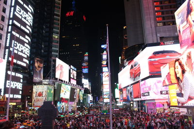 Crowd in city at night