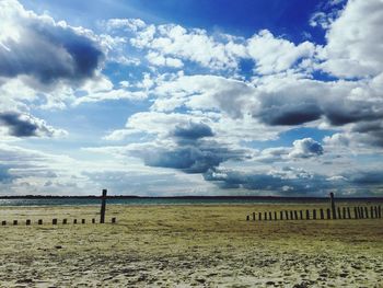 Scenic view of beach against sky