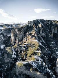 Scenic view of rock formations against sky