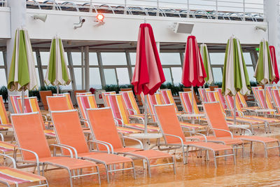 Empty chairs and tables in restaurant