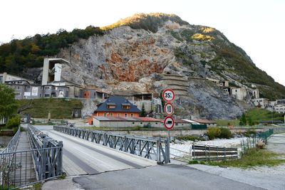 View of bridge in city against sky