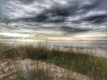 Scenic view of beach against sky