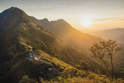 Scenic view of mountains against sky during sunset