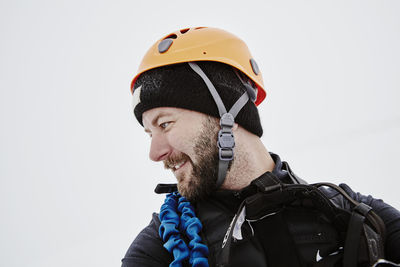 Smiling climber looking away